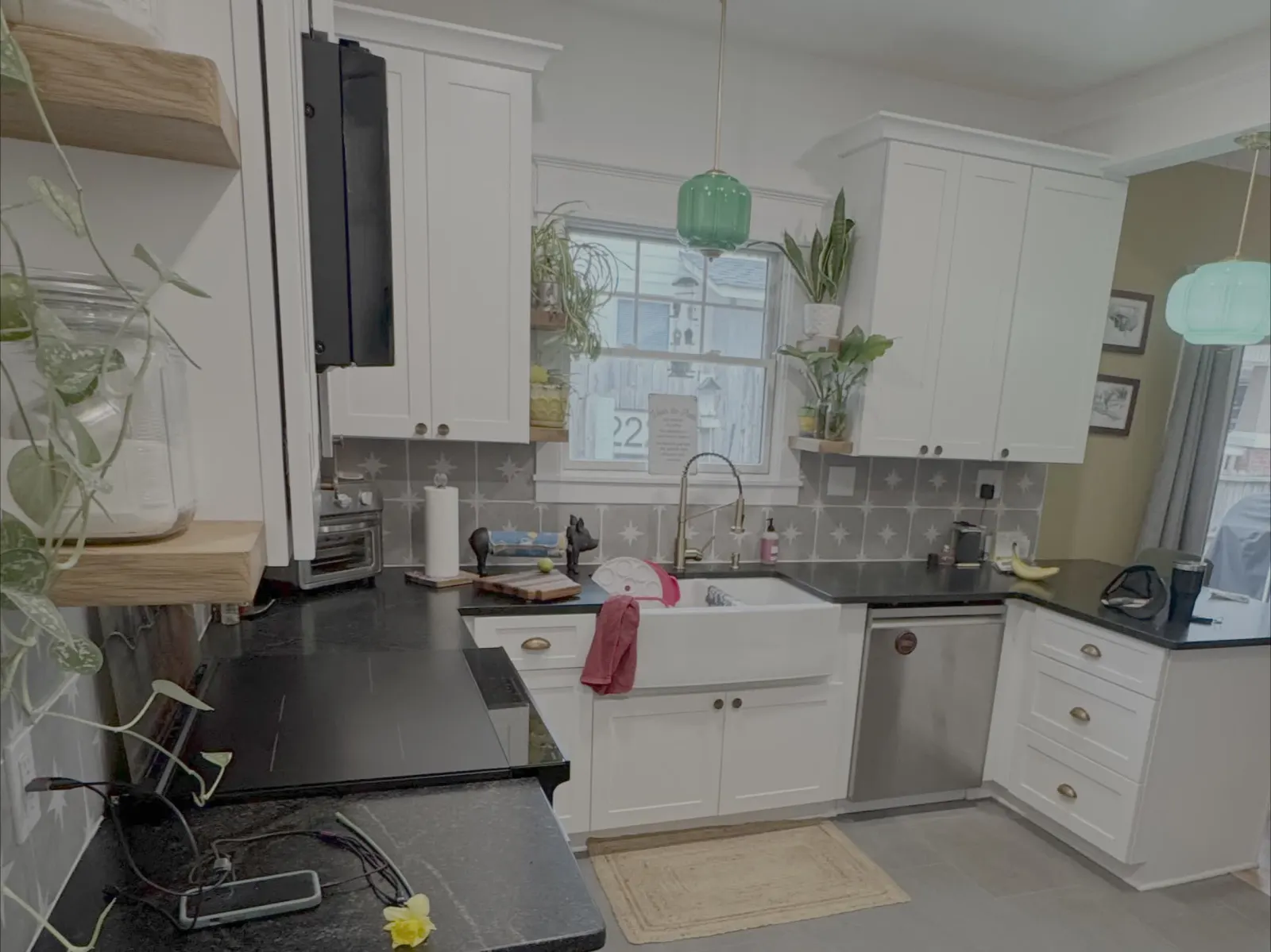 Kitchen remodel with tile backsplash and hardwood finish carpentry