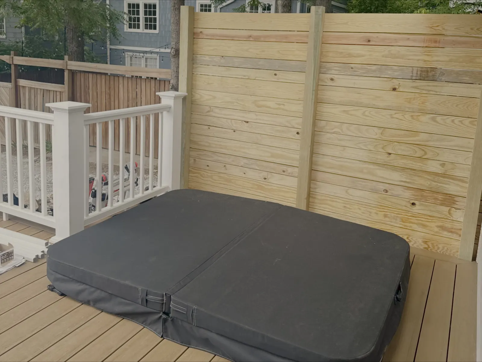 Composite deck and custom fencing around hot tub