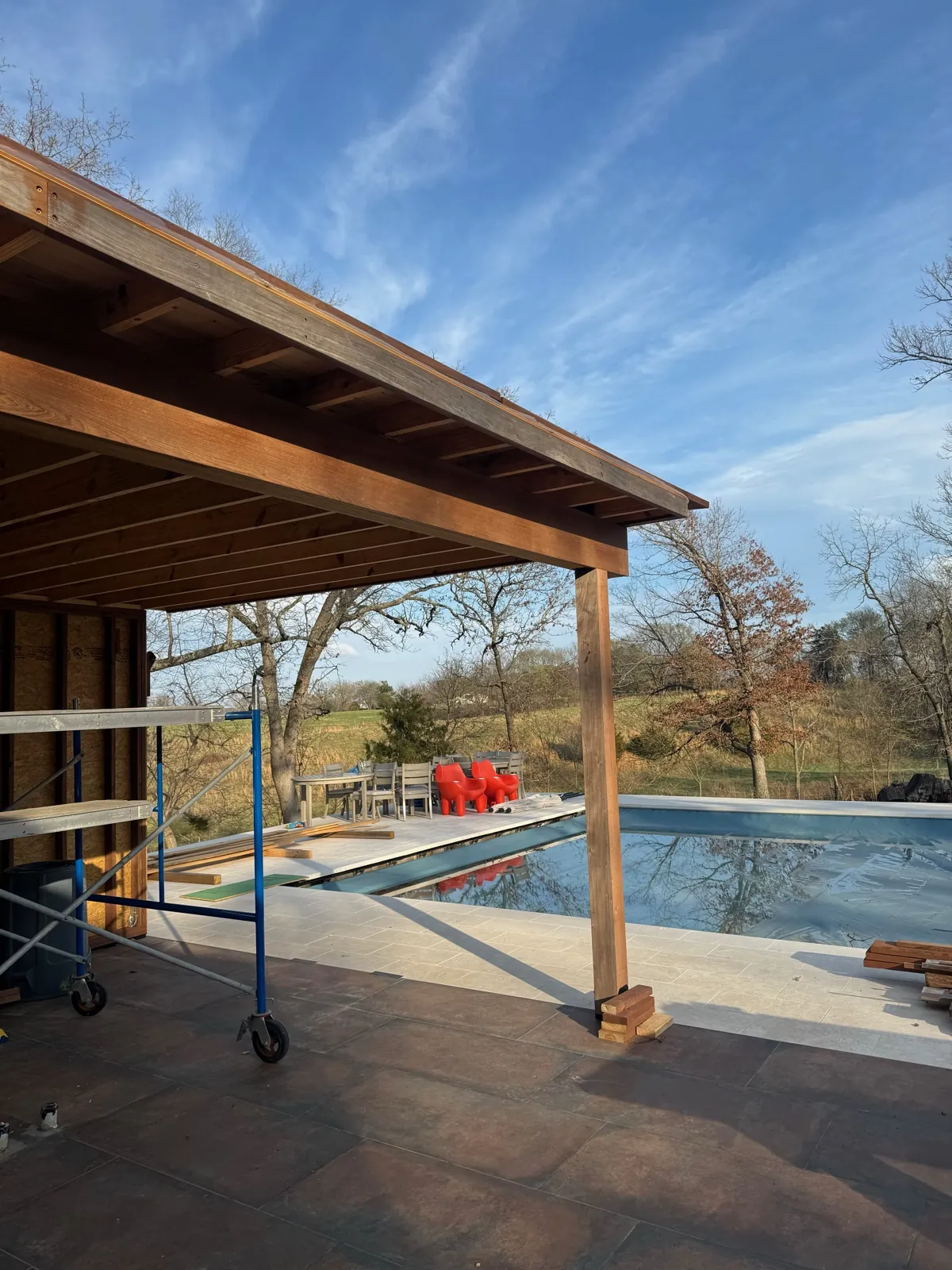 Ipe pergola overhang with pool view