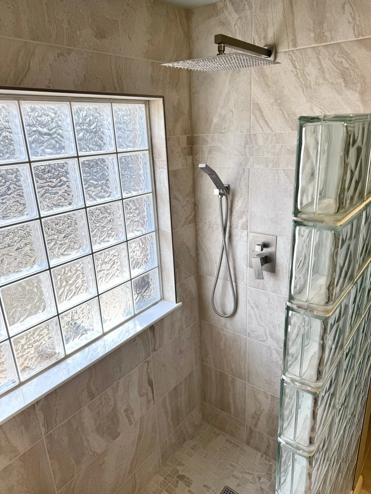 Glass block shower with dual shower heads